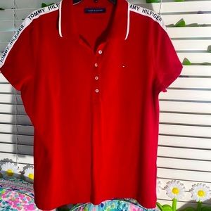 Tommy Hilfiger red polo style shirt with white logo trimmed shoulders & collar